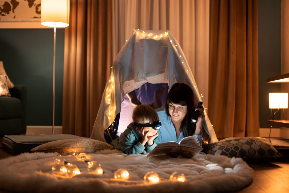 Evening Journaling: A Life-Changing Nightly Habit 2 Evening Journaling with mother and kid reading and writing together in a cozy night setting
